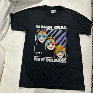 Vintage Mardi Gras T shirt with harlequin masks and purple lightning.